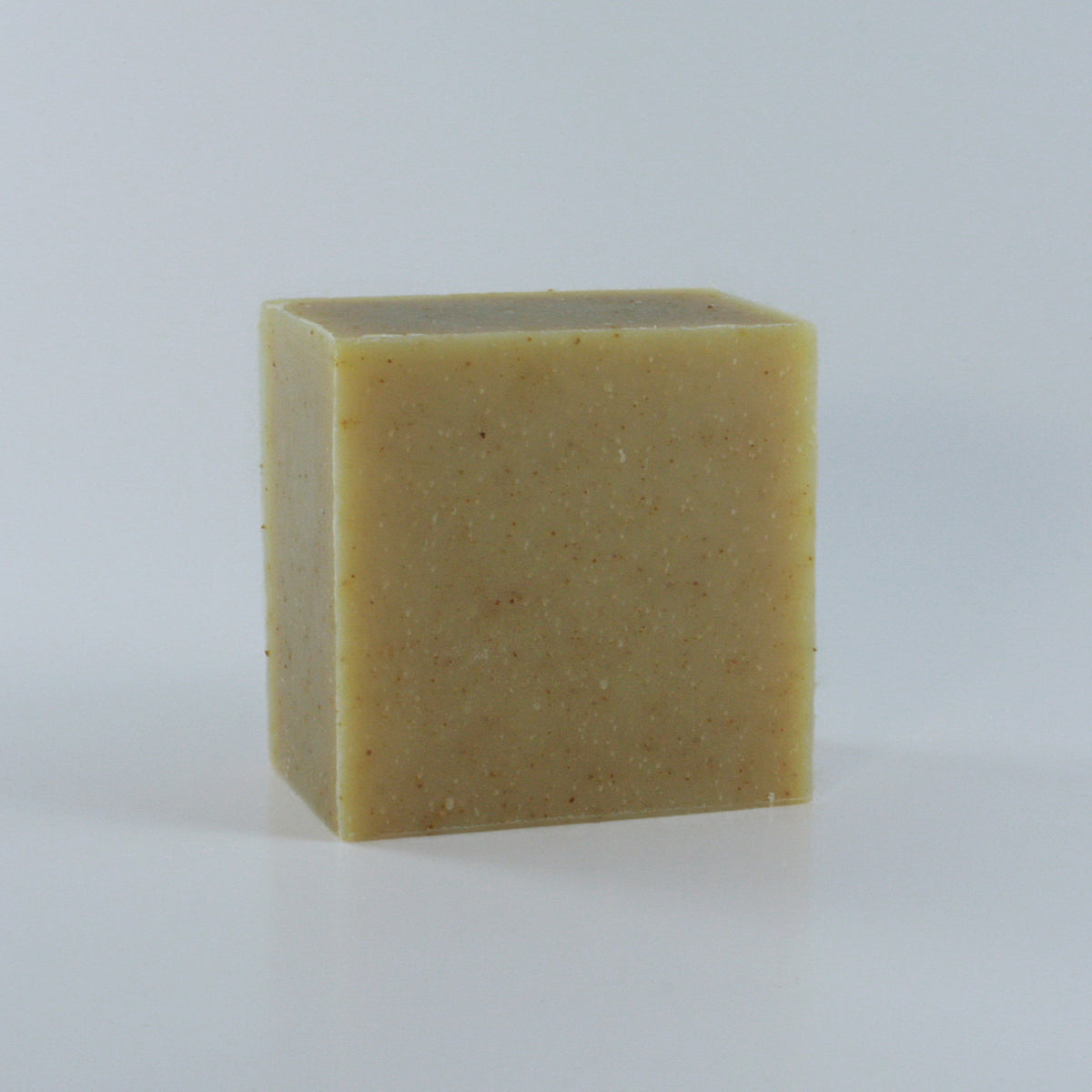 Revive Citrus Mint Soap with a yellow speckled texture and clean rectangular shape.
