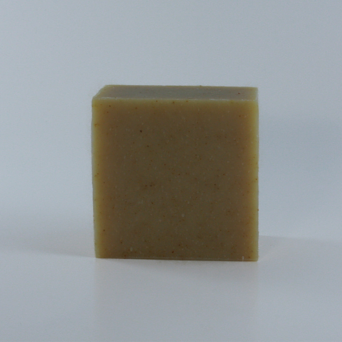 Revive Citrus Mint Soap with a yellow speckled texture and clean rectangular shape.
