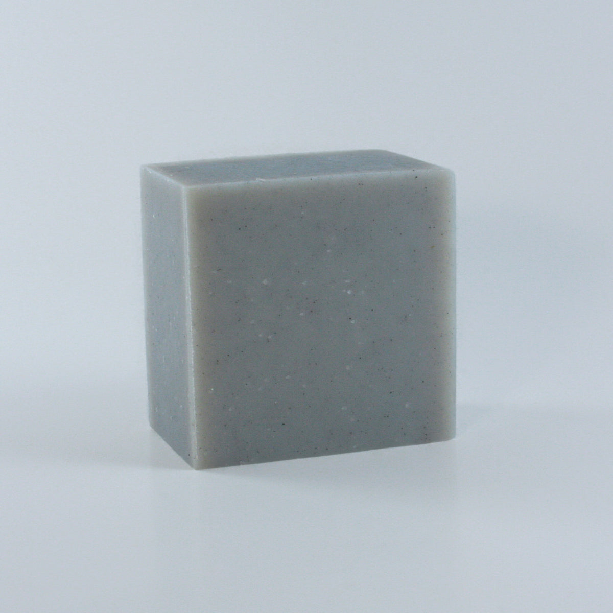Thaw Herbal Mint + Floral Soap with a creamy light blue finish and clean rectangular shape photographed from an angle.